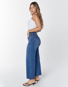 Wash: Rowena DESCRIPTION Noemi, our high-rise wide leg crop. Featuring classic 5-pocket styling and antique nickel hardware. Fits true to size. STYLE#EW2001076 FABRIC + CARE Power Stretch.[ 67% Cotton / 28% Polyester / 4% Rayon / 1% Spandex ] Machine wash cold with like colors, do not bleach, tumble dry low, low iron if needed. DETAILS Points of Measure Size 27: front rise 12" leg opening 21" inseam 26.5" Model is 5`9" and wearing a size 26SIZE GUIDE SEE OUR FIT GUIDE Can't find your size?Email our customer service team to help! cs@unpublishedcollection.com or find the store near you from our STOCKISTS' page. Medium Wash Wide Leg Cropped Jeans With Belt Loops, Everyday Cropped Bottoms With Five Pockets, Medium Wash Cropped Bottoms With Five Pockets, Everyday Dark Wash Cropped Bottoms, Dark Wash Cropped Bottoms For Everyday, Everyday Cropped Dark Wash Bottoms, Wide Leg Cropped Jeans With Belt Loops For Spring, Classic Cropped Bottoms With Five Pockets, Spring Cropped Leg Flare Jeans