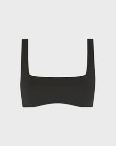 Aria Bikini Top in black is an elegant and timeless bralette with a flattering square neckline. Invisible under-bust support and removable cups. Self-lined in our ultra-soft Embodee™ fabric that has high shaping power. Wide shoulder straps with no fastener provides maximum comfort for swimming and lounging. Wear with Nadia or Tatiana bikini bottom in Embodee™ fabric. Best suits cup sizes A-C. Luxury fabric sustainably made in Italy.Garment sustainably and ethically made in Australia. Chic Black Swimwear With Square Neck, Chic Black Square Neck Swimwear, Black Swimwear With Adjustable Straps And Minimal Stretch, Chic Seamless Square Neck Swimwear, Elegant Black Seamless Swimwear, Black Square Neck Swimwear For Poolside, Black Square Neck Beachwear Swimwear, Black Square Neck Swimwear, Black Square Neck Beachwear