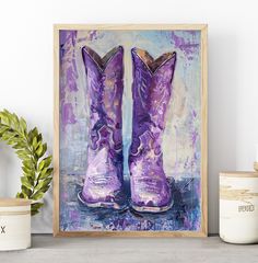 a painting of a pair of purple cowboy boots sitting on top of a shelf next to a potted plant