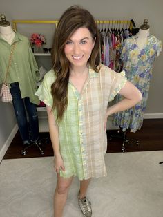 An everyday dress that's perfect with sneakers? We're in! This easy-to-wear button front dress is a no-brainer for summer. The lightweight fabric works on the hottest of days and the combo of spring green, yellow, and taupe is such a fun color palette. You can style this as a dress or, if you're taller, style it like a tunic. This silhouette is a customer fave every year so we're so excited to have it in a fresh new print! This is not lined. We do not feel like you need anything extra besides nu Casual Multicolor Shirt Dress For Summer, Multicolor Shirt Dress For Spring Beach Occasion, Multicolor Shirt Dress For Beach And Spring, Multicolor Shirt Dress For Beach In Spring, Summer Cotton Shirt Dress With Buttons, Multicolor Shirt Dress For Summer Daywear, Multicolor Button-up Shirt Dress For Summer, Cotton Summer Shirt Dress For Day Out, Summer Cotton Shirt Dress For Day Out