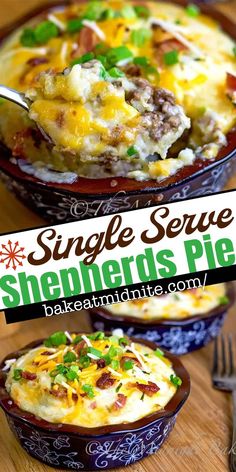 two bowls filled with shepherds pie on top of a wooden table