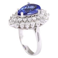 Stamped: 14K White GoldTotal Ring Weight: 9.3 GramsRing Length: N/ARing Width: N/AGemstone Weight: Total Natural Tanzanite Weight is 4.11 Carat (Measures: 13.55x9.40 mm)Color: BlueDiamond Weight: Total Natural Diamond Weight is 2.10 CaratColor: F-G, Clarity: VS2-SI1Face Measures: 24.17x19.03 mmSku: [703397W] Elegant Gia Certified Pear-shaped Sapphire Ring, Gia Certified Sapphire Pear-shaped Rings, Formal Cluster Gemstones Fine Jewelry, Gia Certified Pear-shaped Sapphire Ring, Elegant Pear-shaped Multi-stone Sapphire Ring, Tanzanite Brilliant Cut Formal Rings, 14k White Gold Pear-shaped Formal Ring, Formal 14k White Gold Pear-shaped Ring, Pear-shaped Sapphire Multi-stone Ring