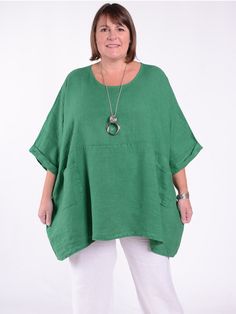 A Lagenlook Oversized Linen Tunic is a loose-fitting, comfortable top designed in the Lagenlook fashion style. It is made from quality Italian linen and features batwing sleeves and pockets!. The tunic is designed to be worn oversized and typically falls below the hips, making it ideal to pair with leggings or skinny jeans. It is a popular choice among those who value both style and comfort in their clothing. Beautiful Quality Italian Linen  Round Neck  Bat wing Sleeves  Front Pockets  100%  Qua Green Oversized Crew Neck Blouse, Oversized Green Crew Neck Blouse, Casual Tunic With Relaxed Fit And Batwing Sleeves, Green Relaxed Fit Top With Batwing Sleeves, Green Relaxed Fit Tops With Batwing Sleeve, Green Tops With Batwing Sleeve And Relaxed Fit, Green Casual Relaxed Fit Tunic, Green Relaxed Fit Casual Tunic, Oversized Green Relaxed Top