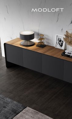 the modern sideboard is made from wood and has two drawers on each side, one with