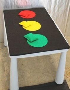 a table with three different colored circles on it