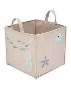 an ocean themed storage bin with sea creatures on it