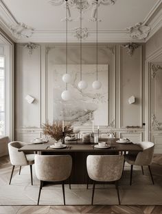 an elegant dining room with chandelier, chairs and art work on the wall