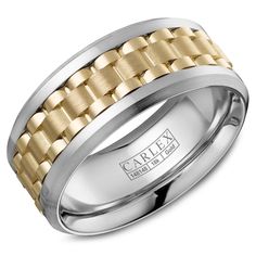 a men's wedding band with two tone gold and silver inlays on it