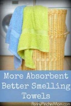 towels are sitting in a basket with the words more absorbent better smelling towels