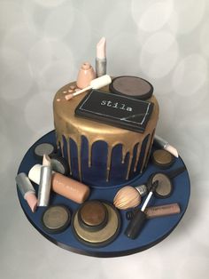 there is a cake with makeup on it