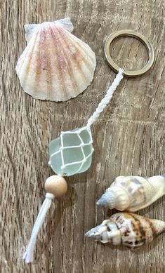 seashells and sea glass on a wooden table