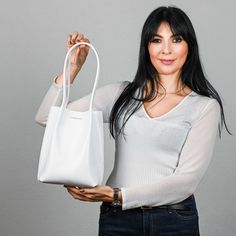 ● This bag model is simply the best solution for a modern woman. Its shape is perfect, the size is very roomy and you can get both comfort and a beautiful minimalist design in one bag. The quality of genuine leather for bags is very high, the bag keeps its shape perfectly. We also offer several size options for your most necessary daily items: phone, gadgets, cosmetic bag, wallet, notepad ● ● On top between the handles of the bag is the logo of the store. It can be a place for your personalizati Minimalist Satchel Bucket Bag For Office, Minimalist Satchel Shoulder Bag For Shopping, Minimalist Square Shoulder Bag For Shopping, Minimalist Bucket Shoulder Bag For Shopping, Minimalist Satchel Shopping Bags, Minimalist Shopping Satchel Bag, Minimalist Bucket Shoulder Bag With Leather Handles, Minimalist Square Hobo Bag For Everyday Use, Modern Daily Top Handle Hobo Bag