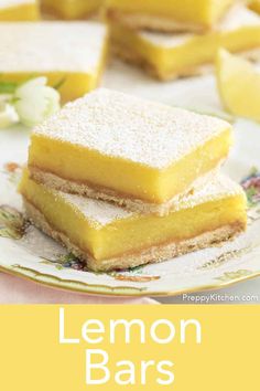 lemon bars stacked on top of each other with the words lemon bars in front of them