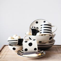 black and white dishes with polka dots on them