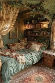 a bed sitting under a window next to a book shelf