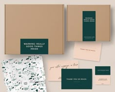 an assortment of stationery items including envelopes, note cards and business cards