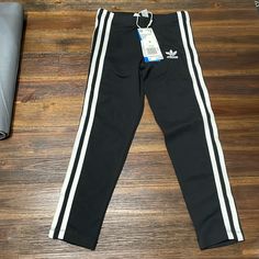 Adidas 3 Stripes Legging Size: 5-6y / Medium Retail Price: $28 New With Tags! Feel Free To Ask Any Questions Or Send Me An Offer! Reasonable Offers Will Be Accepted! Ship Leggings Within 24-48 Hours From Time Of Purchase. White Spring Activewear With Three Stripes Branding, White Activewear For Spring, Casual Black Cotton Leggings, Casual Three Stripes Leggings For Spring, Casual White Activewear For Play, Casual White Leggings For Streetwear, Adidas 3 Stripes, Striped Leggings, Send Me