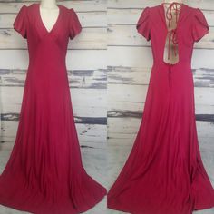 Vintage 1970s burgundy red open back maxi dress. Full length with a v-neck with tulip sleeves. Empire waist with a full, long skirt. Open back double ties. Zips up the back of the skirt. Floor length hem. Dress is heavy. I'm not positive of fabric content but may be acrylic or acetate. You can see a close up of the fabric in the last pic. Excellent vintage condition. Free from rips, stains and holes. Shows minimal age appropriate wear. No size tag. Fits most like a size Medium. There is some roo 70s Fashion Women, Baby Blue Maxi Dress, Burgundy Gown, Burgundy Outfit, Open Back Maxi Dress, Retro Lingerie, Tulip Sleeve, Tulip Dress, Vintage Clothes