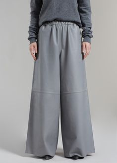 Color: Grey Midweight smooth leather Relaxed fit Wide leg Elasticated waistband Side seam hip pockets Slip-on style Unlined 100% Lamb Skin Dry Clean By The Frankie Shop. Made in India Wide Leather Pants, The Frankie Shop, Frankie Shop, Smooth Leather, Sydney, Leather Pants, Wide Leg, Slip On, Relaxed Fit