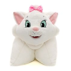 a white stuffed animal with a pink bow on it's head and big eyes