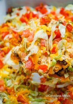 a pizza with lots of toppings in a pan