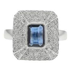 a blue and white diamond ring