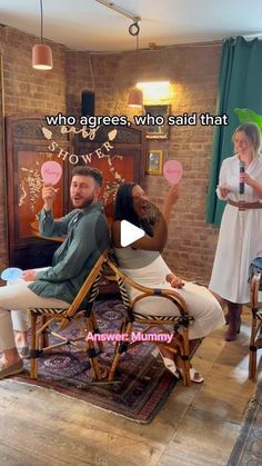 a man sitting in a chair with two women standing behind him and the caption says who agrees, who said that