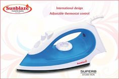 a blue and white steam iron with the words sunblaze on it's side