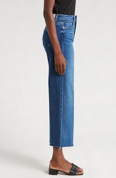 The faded wash and roughed-up edges of these wide-leg jeans offer an authentic rigid look, but the denim is surprisingly soft and stretchy with great recovery. 26" inseam; 22 1/2" leg opening; 12" front rise; 15" back rise (size 29) Zip fly with button closure Five-pocket style 93% cotton, 5% polyester, 2% spandex Machine wash, line dry Imported Faded Flare Jeans With Frayed Hem In Rigid Denim, Faded Flare Jeans With Frayed Hem, Medium Wash Wide Leg Cropped Jeans With Frayed Hem, Faded Wide Leg Cropped Jeans, Faded Wide Leg Jeans With Frayed Hem, Faded Denim Flare Jeans With Straight Hem, Relaxed Fit Faded Flare Jeans With Frayed Hem, Faded Relaxed Fit Flare Jeans With Frayed Hem, Faded Flare Jeans With Frayed Hem And Relaxed Fit