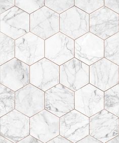 an abstract marble tile pattern with gold lines and hexagons in the center