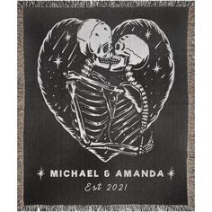 a black and white photo of a skeleton in a heart with the words michael & amanda on it