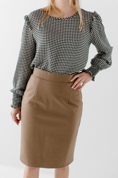 With clean, simple lines and sophisticated style, the 'Anna' is the perfect pencil skirt your closet has been waiting for. Quality fabric, full lining and structured style ensure a modest and flattering fit while an elastic waistband keeps you comfortable. Exclusively designed with you in mind! 68% Rayon 27% Nylon 5% Spandex Hand Wash Cold Separately or With Like Colors Do Not Bleach Hang to Dry Low Iron if Needed 1.75" Waistband Fully Lined Model Height 5'7" | Wearing Size Small in 24" Length P Brown Relaxed Mini Skirt For Workwear, Relaxed Brown Mini Skirt For Work, Fall Workwear Pencil Skirt, Relaxed Fit Pencil Skirt For Workwear In Fall, Brown Relaxed Fit Mini Skirt For Workwear, Modest Fitted Bottoms For Fall, Workwear Brown Relaxed Mini Skirt, Chic Lined Pencil Skirt For Fall, Lined Pencil Skirt For Workwear In Fall