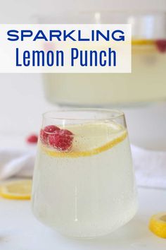 sparkling lemon punch in a glass with raspberries