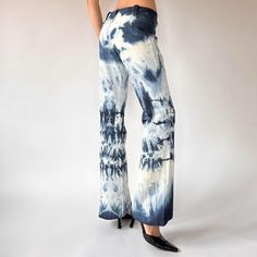 70s Custom Tie Dye Jeans  Details: * Vintage from the 1970s  * Mid rise * Flare  * Zipper & hook closure    Sizing: * Size: small  * No tags - see measurements!  * Waist 28-29" * Rise 9.5" * Hips 38" * Inseam 30"  *Please note imperfect vintage condition with discoloration  Model Measurements:   Sophie is 5'6" and a size XS/S.  Her waist measures: High 26", Mid 30", Low 32", with a 36" Hip Bust 32B Dye Jeans, Tie Dye Jeans, Vintage Hippie, Custom Ties, High Waisted Flares, Tie And Dye, Womens Jeans, Vintage Jeans, True Vintage