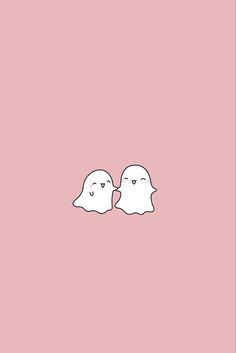 two white ghost faces on a pink background