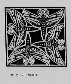 an old book with some black and white designs on the front cover, which is in color