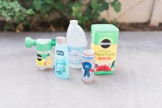 several different types of cleaning products sitting on the ground