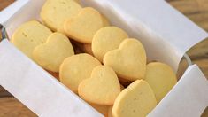 some heart shaped cookies in a box on a table