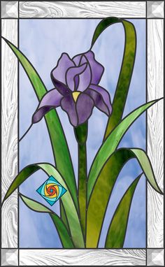 a stained glass window with a purple flower