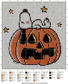 a cross stitch pattern with a pumpkin and cat on it's head, in the middle