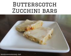 two pieces of butterscotch zucchini bars on a white plate with the title overlay