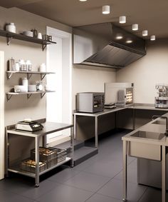 an industrial kitchen with stainless steel appliances and shelving