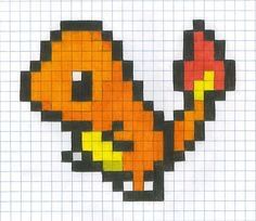 the pixel art is made with squares and colored pencils to look like an orange bird