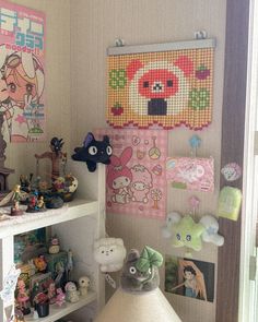 a room filled with lots of stuffed animals on top of bookshelves next to a window