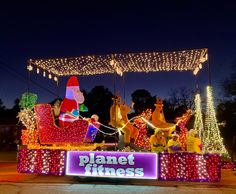 an outdoor display with christmas lights and decorations