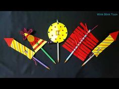 four different types of kites made out of construction paper and colored pencils on a black background