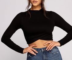 Be a total stylish stunner in this chic crepe knit crop top! Featuring a high neckline. a cropped tulip hem and a form-hugging fit. this top would pair perfectly with high waist denim and heeled booties. Make this part of your new fall wardobe!Fit & Features High neckline Long fitted sleeves Cropped tulip hem Form-fitting style Crepe knit fabric Moderate stretch Crop Top Styles, Homecoming Outfits, High Waist Denim, Cropped Tops, Selling Clothes, Knit Crop Top, Knit Crop, High Waisted Denim, Black Crop Tops