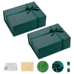 two green gift boxes with ribbons and matching envelopes are shown next to each other