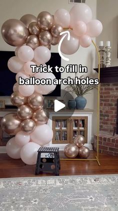 a bunch of balloons that are in the shape of a tree with words trick to fillin balloon arch holes