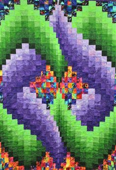 an abstract quilt with purple and green colors